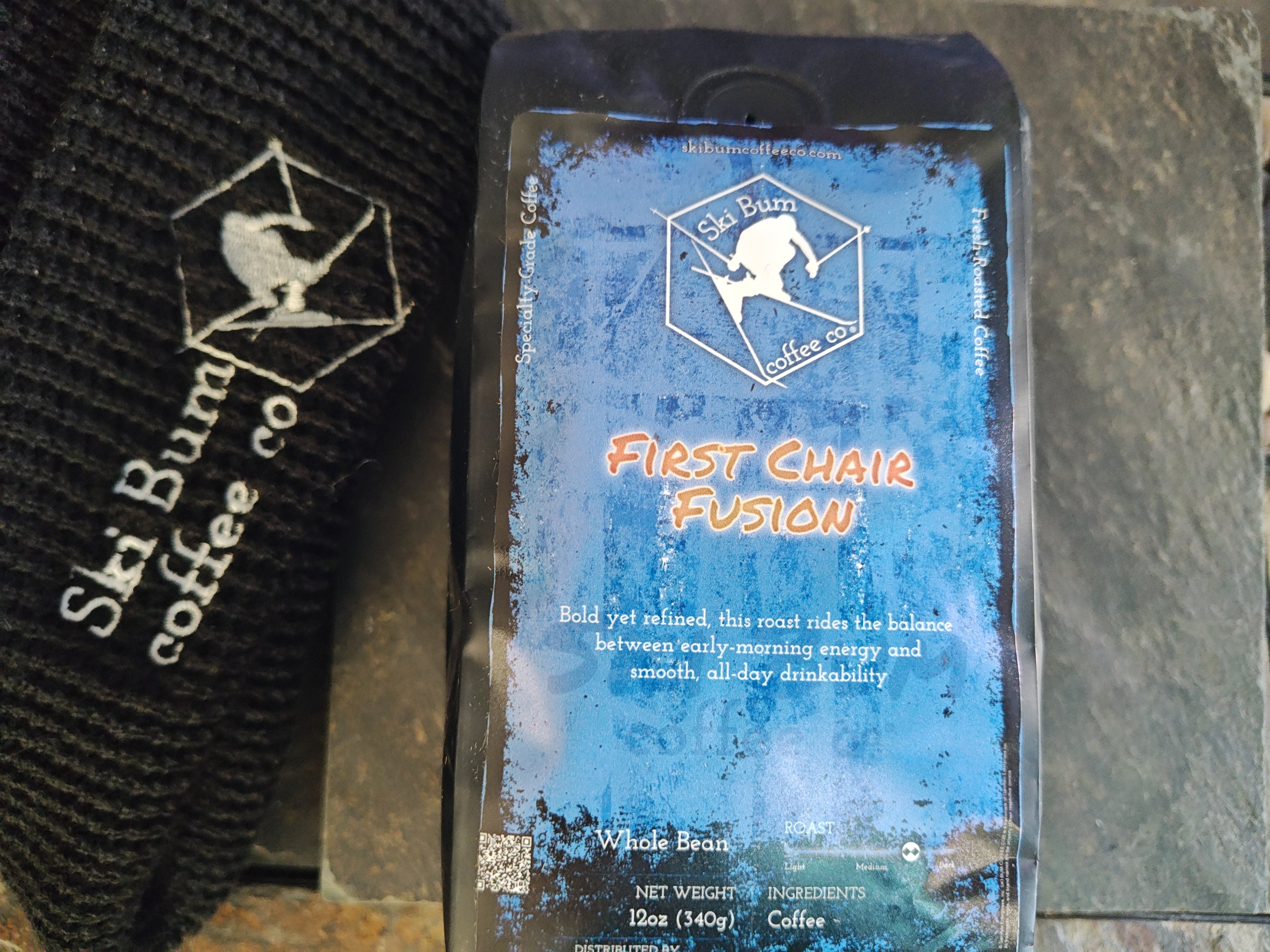 First Chair Fusion blend coffee bag on a stone background