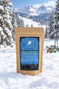 Bluebird Splash Butterfly Blue tea pouch in a snowy ski mountain scene